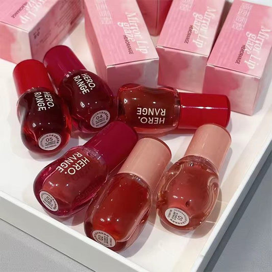 A Herorange tinted super fwee inspired gloss