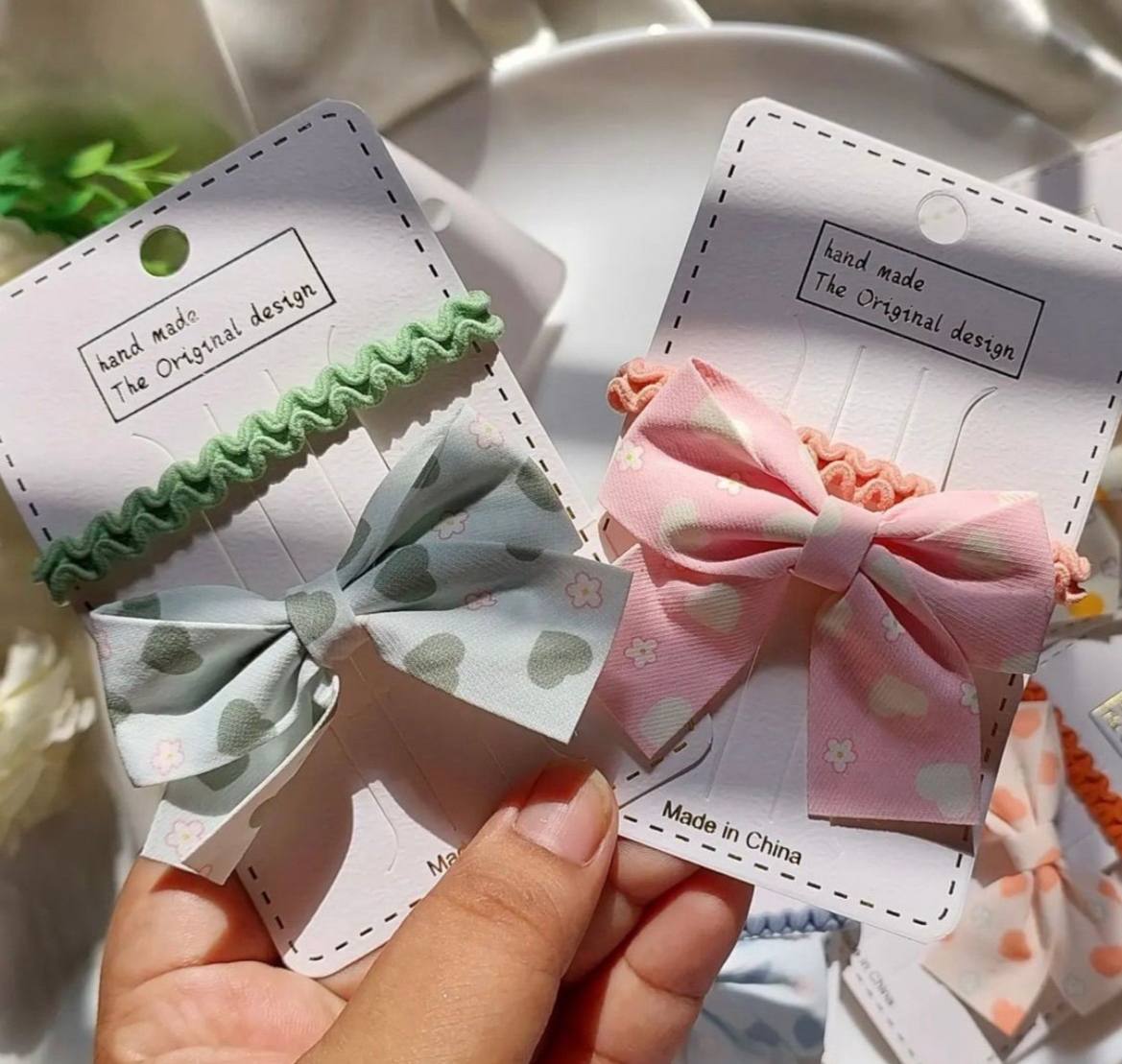 Hair bow and rubber card