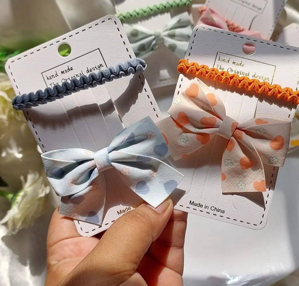 Hair bow and rubber card