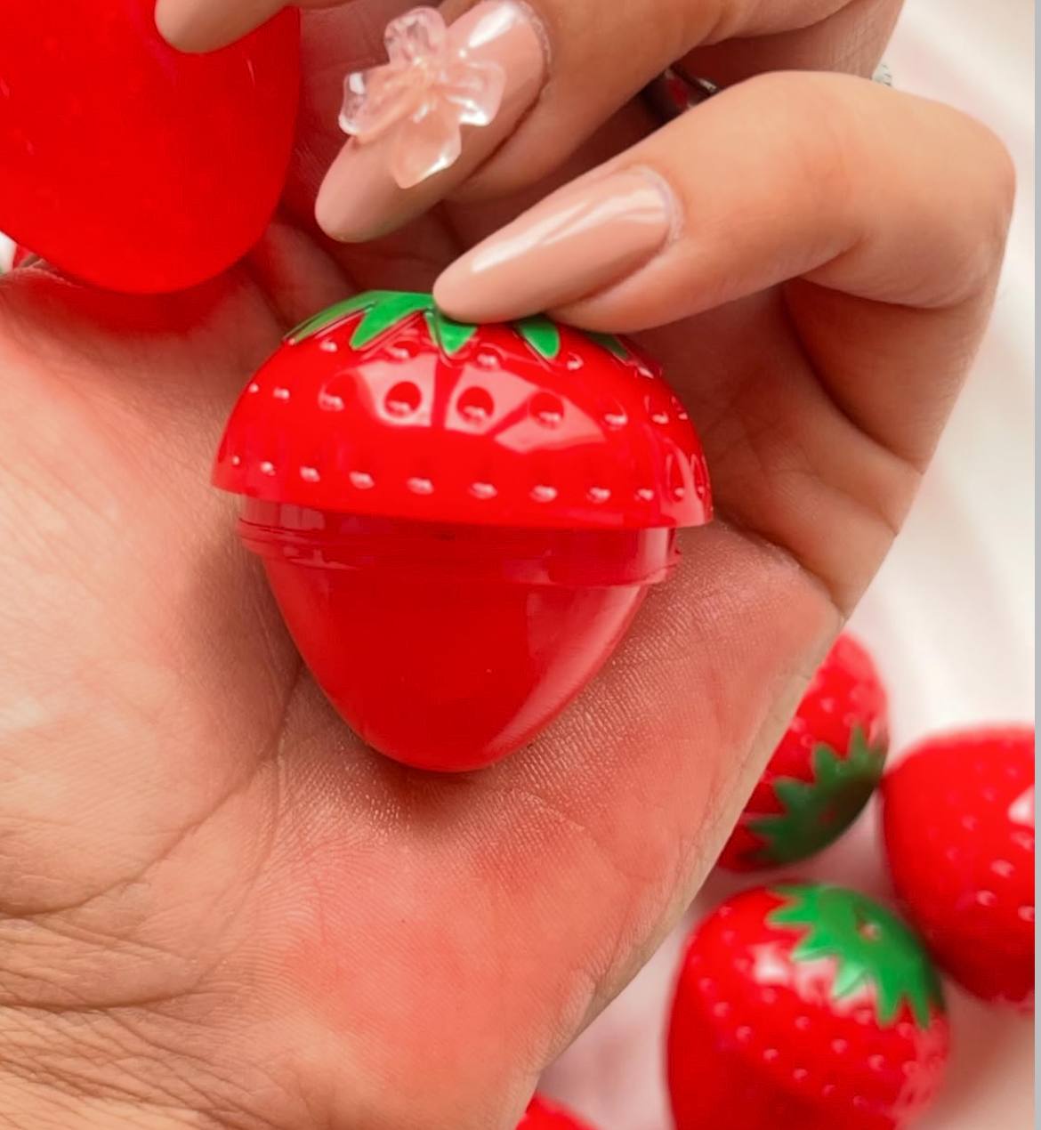 A Strawberry Tinted Moisturizing Lip Balm