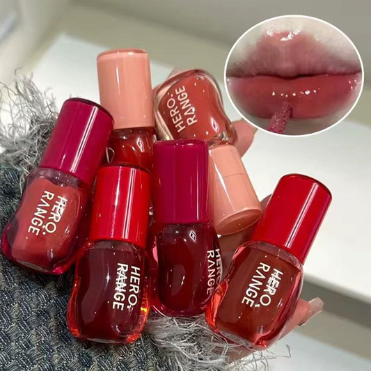 A Herorange tinted super fwee inspired gloss